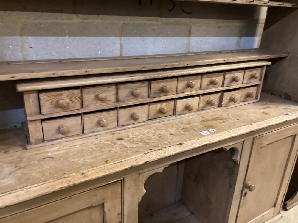 A large Victorian pine dresser, width 182cm depth 48cm height 240cm